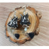 Boucles d'oreilles Fleur de lotus noire feuille blanche